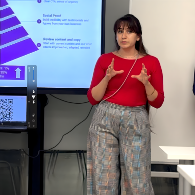 Learning Adelina Iovanesc, an IMBA student presents their team's Digital Marketing Plan_Nero AI_Photo_Face